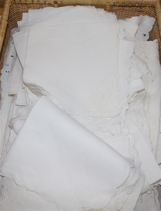 A linen cutwork place mat, runner and napkin set